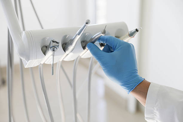 Professional Tooth Extraction technician working in Oshkosh, WI